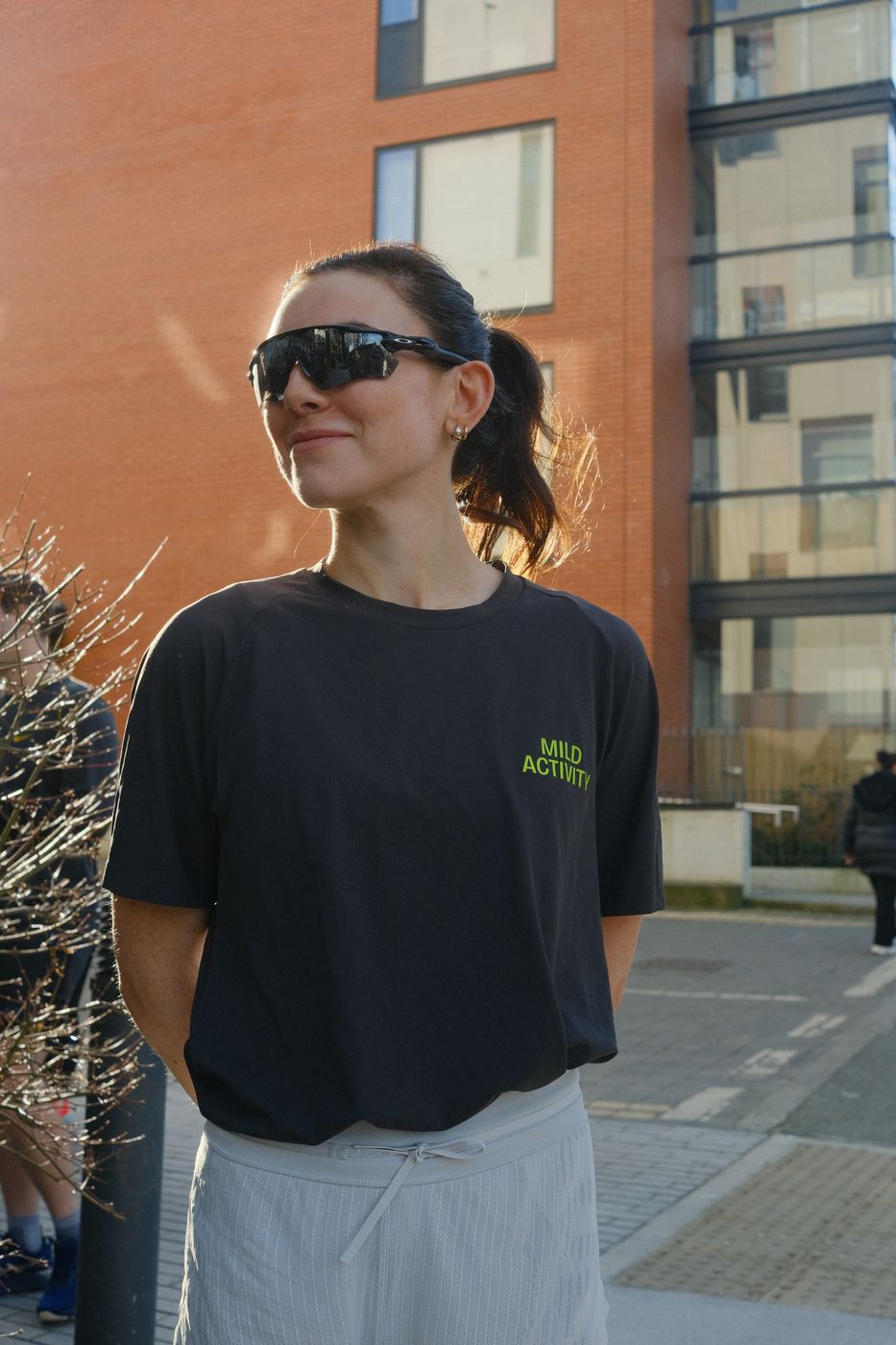 A member wearing a Mild Activity t-shirt and sunglasses.