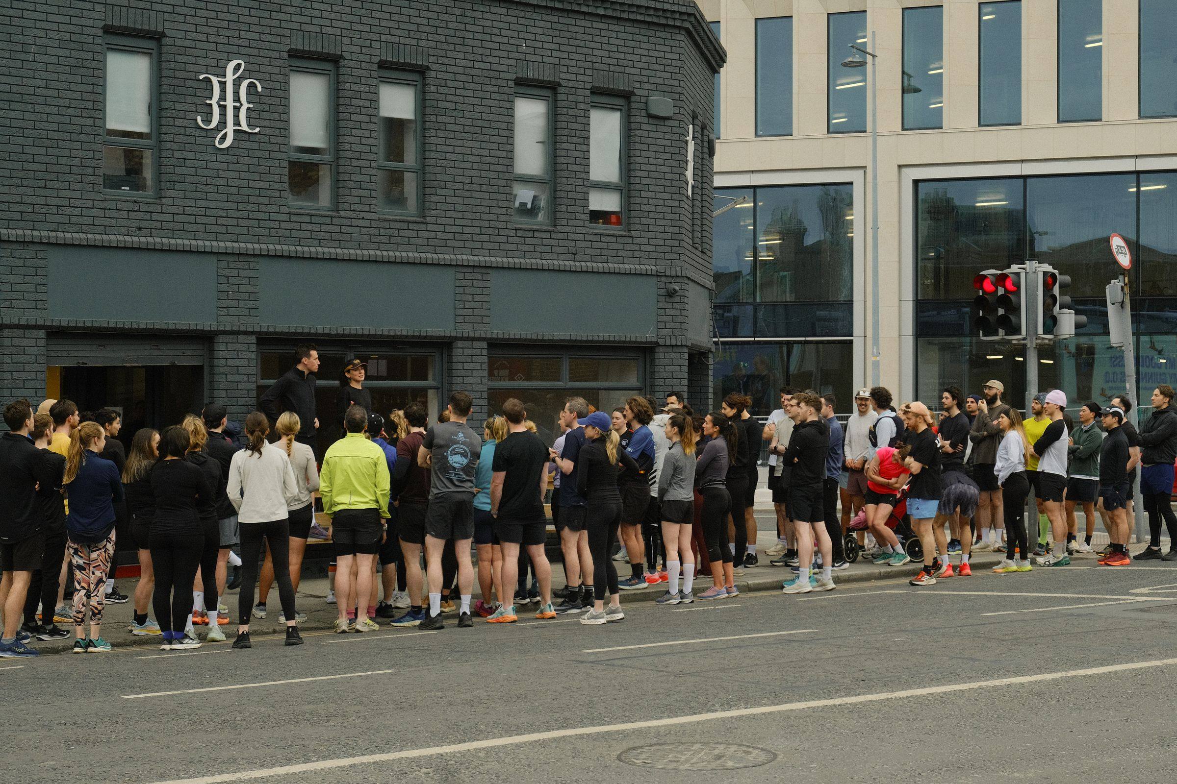 A long line of Mild Activity runners gathered outside 3fe before a run.