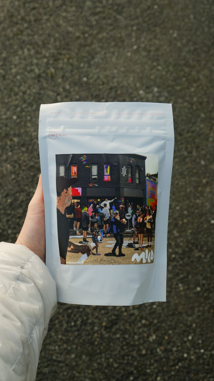 A bag of the Mild Activity coffee blend from 3fe, with an illustration of the club outside the café.