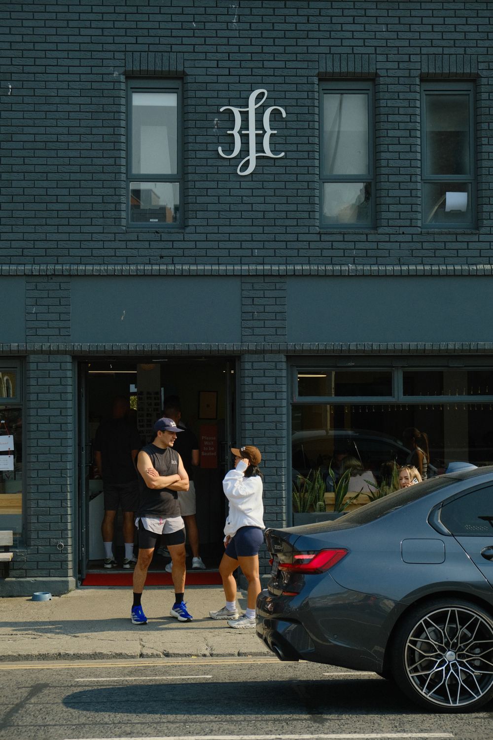 Runners chatting outside the 3fe café after a Sunday run.